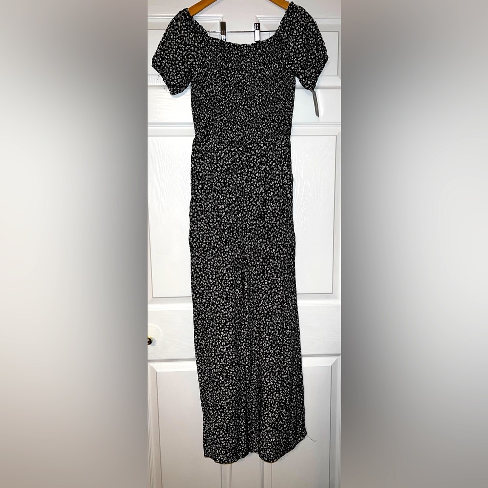 Black jumpsuit with white flowers. This is from Target (art class collection).